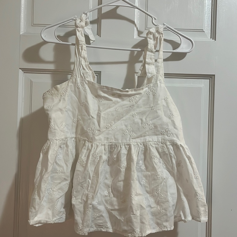 White peplum top